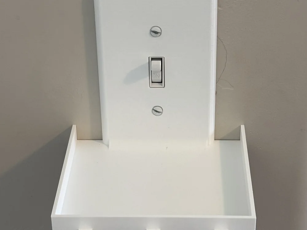 The shelf, empty, showing the one-piece plate and deck